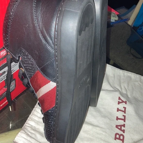 Bally Shoes size 10 ..mostly all black with 2 red stripes and one white stripe